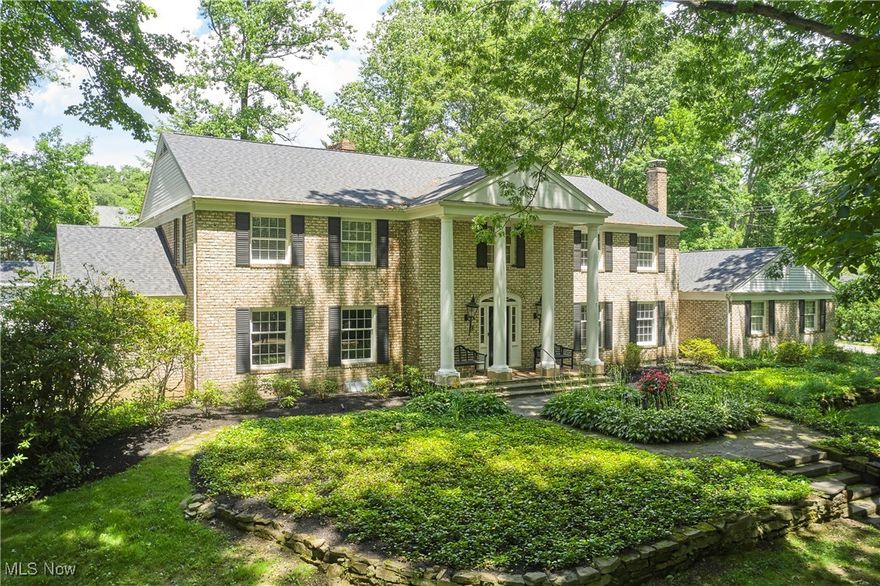 Welcome to this stunning 5-bedroom, 5 full and 2 half bath brick colonial in the highly sought-after Fairlawn Heights neighborhood of West Akron. Completely renovated and offering over 6,100 sq ft of total living space on a private 1.21-acre lot, this home is designed for luxurious living and effortless entertaining. The resort-style backyard features an inground pool, cabana house with full bath, outdoor kitchen, and fireplace. Inside, the gourmet kitchen boasts top-of-the-line appliances and walk-in pantry.  Enjoy multiple living spaces including spacious formal living, dining room, as well as a cozy family room with fireplace. A serene 3-seasons porch overlooks the backyard, while the first-floor primary suite offers a private office, spa-like bath, dressing room, and slider to rear patio. Four additional bedrooms, three full baths, and a loft complete the second floor, accessed by both front and back staircases. The finished lower level includes a rec room with fireplace, theatre room, fitness room, and full bath. Additional highlights include laundry rooms on both floors and a 3-car garage, all in one of West Akron’s most prestigious communities.