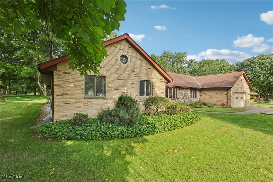 Set on a full acre with serene views of mature trees and a peaceful creek just beyond the backyard, this impressive 3-bedroom, 2.5-bath ranch-style home offers nearly 2,600 sq ft of spacious main-floor living. The striking stone front and beautifully landscaped entry provide standout curb appeal.
Inside, the open living room flows seamlessly into a raised dining area, all bathed in natural light. The kitchen opens to a cozy family room featuring a gas fireplace, creating the perfect space for gathering and relaxing.
The spacious primary suite is a private retreat with a luxurious en-suite bathroom. Two additional bedrooms offer plenty of space for family, guests, or a home office. A full basement adds incredible potential for extra living space, recreation, or storage.
The oversized tandem garage includes a rear garage door, allowing convenient access to the backyard—ideal for outdoor entertaining, yard equipment, or extra vehicle storage.
With its desirable layout, stunning natural setting, and room to grow, this home offers comfort, character, and convenience all in one. Don’t miss your opportunity—schedule your showing today!