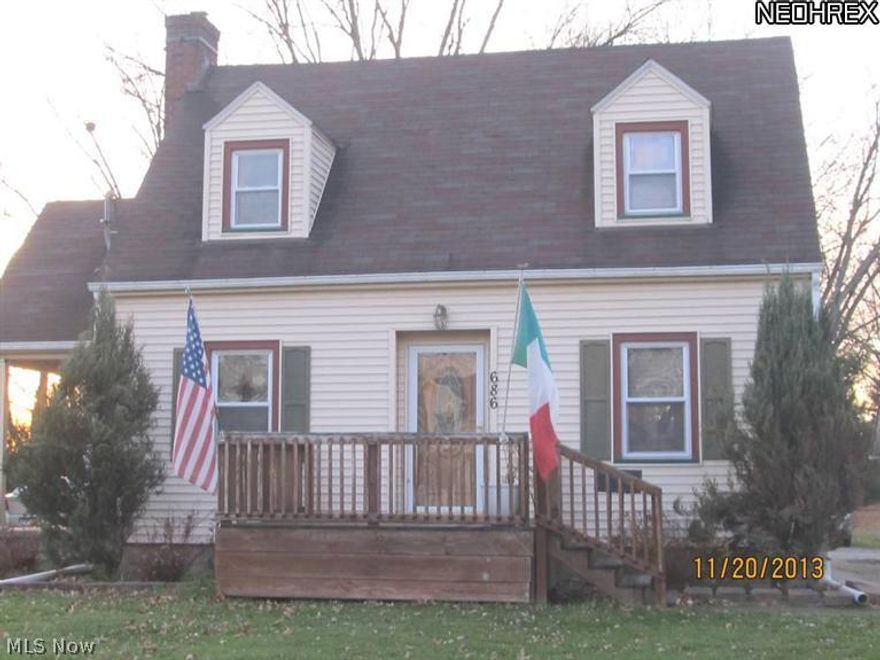 This is a warm cozy home with much to offer. The kitchen has ceramic floor tile. Hardwood floors throughout. Front and side porch. Huge 3-Car garage. This home is move-in ready condition. All appliances stay.