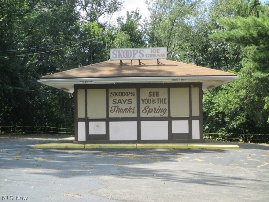 Formerly Skoops Drive-in, this could be the right opportunity for you!  There are 4 city lots on the corner of Fairview Ave. and Fifth St, a very busy corner where your business would be very visible.  The building is 504 sq ft. and has a large built in cooler, small restroom, and counter windows plus shelving and storage. At the back of the large parking lot, there is a storage barn which is included.  The sale would be subject to the buyer applying to the City of Barberton for a variance for their intended usage.