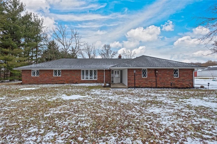 Situated on 4.3 acres in Columbia Station, this beautiful brick ranch-style home is eagerly awaiting its new owner! As you step inside, you will immediately appreciate the spacious living room with a picture window that lets in plenty of natural light. The formal dining room attaches to the eat-in kitchen. The family room features a cozy brick fireplace and sliding glass doors that open to a bright sun room. The master bedroom features a large closet and a lovely en-suite bathroom. Two additional spacious bedrooms, a full bath, a half bath, and a convenient laundry room complete the interior of this home. Outside, you will find a large concrete patio, perfect for grilling and entertaining in warmer months, and a half-acre pond with a deck. Other recent updates include a newer furnace, newer air conditioner, and newer pantry doors and interior doors. Located on Snell Road, this home is just minutes from the Columbia Reservation and very convenient to area highways. Do not miss out on th