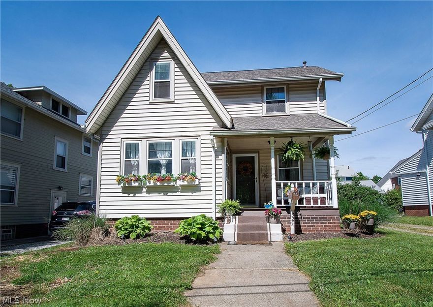 Charming and updated Colonial home in this quaint N. Canton neighborhood! You will love the inviting front porch, the open floor plan, the convenience, and everything this home has to offer. The great room with original hardwood floors is nice-sized and cozy. Open to the spacious and completely updated eat-in kitchen that offers stainless steel appliances, white cabinets, beautiful light fixtures, subway style backsplash, Quartz countertop, a breakfast bar, and plenty of natural light. Upstairs is an updated bathroom and ample size two bedrooms with lots of storage space/closets and hardwood flooring. The finished basement adds 400 plus sq ft of living space & features a fantastic mudroom with laminate floors & built-in white cabinets, and a 3rd bedroom/master bedroom with a walk-in closet and a master bath with a walk-in shower (tiles surround), and hook-up for the washer & dryer. Enjoy the outdoors from the large stone patio or watch the children play from your cozy front porch overl