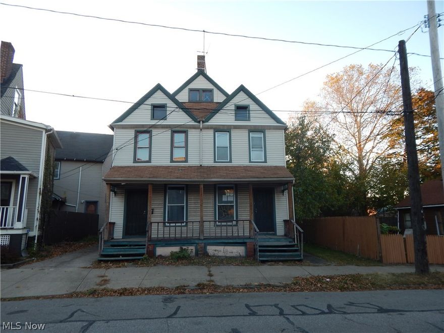 Lots of potential found in this  4 unit investment property! Kitchens with adequate counter and cabinet space. Nice sized rooms. Hardwood floors. Don't miss the one car detached garage too! Being sold as-is. Call today to schedule a tour!