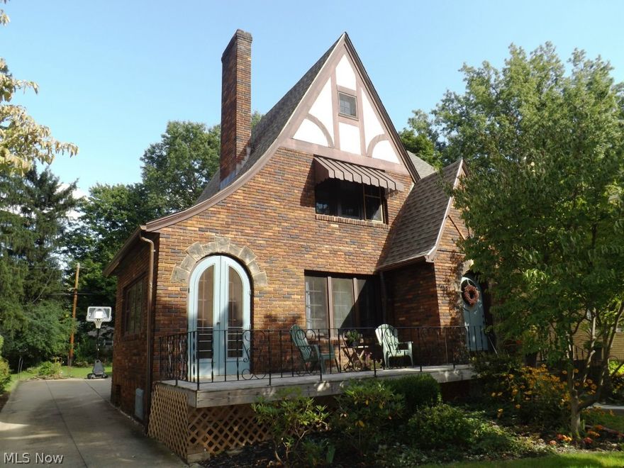 All brick Tudor built in 1928 offers 3 stories, 4 bedrooms, 2.5 baths, formal dining room, large living room with fireplace and study with wall of windows.   This beautiful home is full of character and has original woodwork and hardwood floors in most rooms.