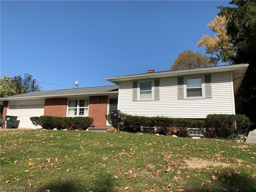 Three Bedroom 1.5 Bathroom Split Level on two parcels.  This home has a large first floor living room and a spacious family room in the basement.  The dining room has a sliding door to the back yard.  The laundry room is in the lower level with plenty of storage space.  There is a convenient two car attached garage with a man door leading to the back yard.  Seller is selling the home "As Is".  Homes like this don't stay on the market long.  Call today for your private showing.