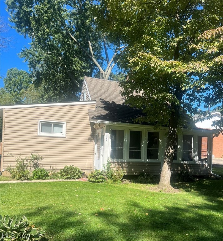 Do not miss out on this ADORABLE 3 bdrm home tucked away in the heart of Cuyahoga Falls. If you are looking for a perfect starter home or investment opportunity - this is the one! You'll find this lovely home on a private dead end street, sitting on a 244 deep double lot (rare find in CF). Step into the living room with loads of natural light & fresh paint throughout. The spacious dining rm leads into the gorgeous kitchen w/ quartz countertops and stainless steel appliances.
The main floor also features 2 bedrooms w/ ample closet space, first floor laundry (W/D Included) and an updated bathroom. Upstairs features a large bedroom w/ a cozy loft which could be a perfect office or play room. The back yard is ideal for pets, entertaining, or the space to create your own private oasis. The enclosed sunroom adds extra charm. Close to downtown, shopping, dining, expressways, hiking trails, schools & more! Don't wait- Schedule your private tour today! (Agent owned)