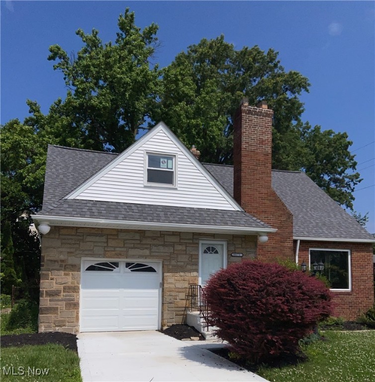 Euclid Bungalow/Cape Cod offers 4 Bedrooms and 1.5 baths! Exterior with full refresh! Curb appeal with Stone/Brick exterior. A solid foundation with a new roof, windows, siding, garage door, gutters and driveway! Interior offers much potential! A mix of hardwood in the living room and dining room gives a nice base to work with. First floor bedroom and full bath is a great convenience. Plus, three more bedrooms upstairs with a half bath offers plenty of flexibility. The enclosed porch off the kitchen offers a cozy space for relaxation. The unfinished basement offers room for storage, workspace, laundry space and offers potential for future finished space. Attached one car garage. This is a Fannie Mae HomePath Property.