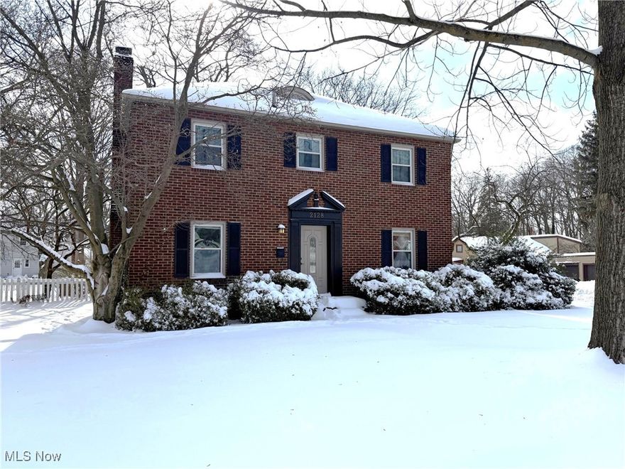 Lovely, well maintained brick two-story home on a corner lot. This home is located in the desirable Plain Local  School District. The home features all wood flooring on the main floor and has a lovely living room with a wood burning fireplace. Front foyer has coat closet. The kitchen has a ceramic tile counter and the refrigerator, gas range, dishwasher and garage disposal stay. There is a dining room off the kitchen as well as a half bath and access to the backyard. The three bedrooms and full bathroom are located on the second floor. The master suite has a walk-in closet. The walk-in closet could be a fourth bedroom. The basement is partially finished and has glass block windows. Energy efficient furnace, central air, 100 amp service, water softener and radon mitigation system. Washer and electric dryer stay. The backyard is completely fenced in and has a beautiful, private seating area. There is a two-car, detached garage.