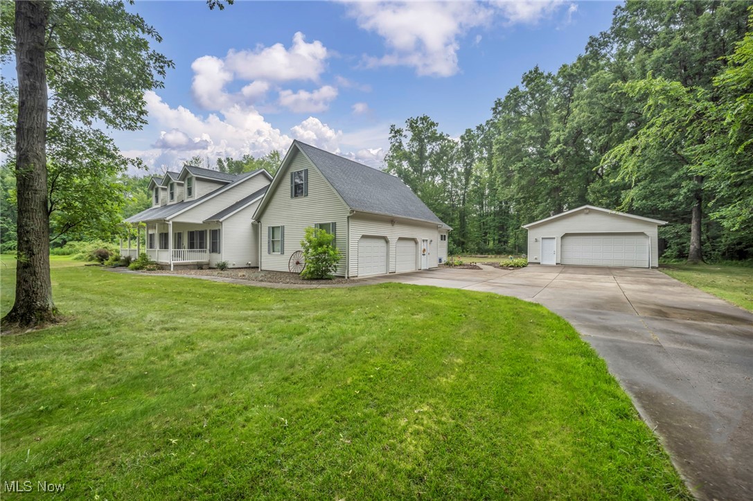 Welcome to this fabulous home nestled on 9.3 picturesque acres. This stunning 2,640 sq ft home offers the perfect blend of comfort and privacy. Enjoy this open floor plan featuring a master bedroom with master bath, 2 additional bedrooms and 2 full baths, a spacious great room with a cozy fireplace, an elegant dining room, and foyer. The eat-in kitchen is a chef's dream, boasting custom-made Craftsman hickory cabinets, island and all newer appliances included. The finished lower level is an entertainer's paradise, complete with a large rec room with pool table, Foosball table and air hockey, workout room with equipment, theater room with seating, full bath, and bonus room. Additional highlights include a 31x11 bonus room above the attached garage, large 40x38 Trex Deck off kitchen with round above ground pool(24 ft wide 52in deep) and patio, a central vac system, a new HVAC system installed in 2024, a new hot water tank from 2023, and a roof updated in 2020. The property also features a large 3-car heated detached garage, perfect for car enthusiasts or extra storage. Don't miss the opportunity to own this exceptional home with plenty of space to roam and relax. Schedule your private showing today!