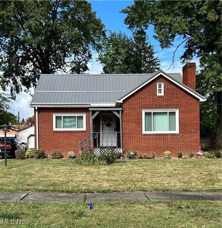 Welcome to this inviting 3-bedroom, 2-bath brick home tucked away in a well-established Warren neighborhood where tree-lined streets and long-time neighbors create a true sense of community. This solid home blends timeless charm with important updates, making it a wonderful place to put down roots.

Step inside and you'll appreciate the thoughtful layout designed for both comfort and convenience. The main level offers a spacious living area filled with natural light, a bright and functional kitchen, and a first-floor bedroom with a full bath nearby perfect for guests, multi-generational living, or anyone who prefers main-floor accessibility. Upstairs, you'll find two additional bedrooms and another full bath, giving everyone their own private space. Closets are generously sized, and there is ample storage throughout the home, making it easy to stay organized.

Practical updates have already been completed, including newer windows that enhance energy efficiency, a hot water tank installed in 2022, and a durable metal roof designed to last for years to come. With these major items taken care of, you can focus on adding your own personal touches.

The exterior is just as accommodating as the inside. A detached garage offers secure parking and additional storage, while the back ramp access makes the home even more welcoming and versatile. Whether you're carrying in groceries, accommodating accessibility needs, or simply enjoying the convenience, this thoughtful feature adds ease to everyday living.

This brick beauty is more than just a house; it's a place to call home in a neighborhood where pride of ownership is clear. With its classic structure, smart updates, and inviting layout, it's ready for its next chapter. Don't miss the opportunity to make it your own!