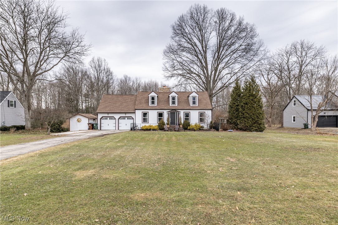 Welcome home to this spacious and well-maintained 4-bedroom, 2-bath Cape Cod nestled on 1.3 acres of picturesque land. This inviting home features an eat-in kitchen and large family room. Enjoy outdoor living with a deck that overlooks the expansive yard, ideal for summer barbecues or simply unwinding in nature. The finished basement offers additional living space, perfect for a home office, playroom, or entertainment area. The owners have made many updates throughout including a new roof (2020), new windows (2020) and new furnace and AC (2021). Do not miss out on this opportunity!