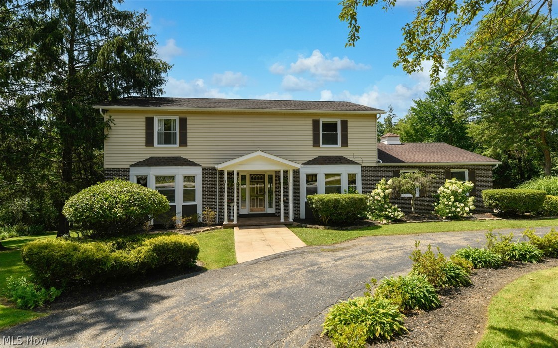 Welcome home to 12982 Lynn Drive! Located in award winning West Geauga School District, this 4 bedroom/4 bathroom colonial home has it all! From the moment you pull up you are wow-ed by the professional landscaping on over an acre of private wooded lot. Upon entering you are welcomed by the home office/den, large dining room and living room with tall ceilings and a stacked stone gas log fireplace with Amish built mantel. The newly remodeled kitchen has newer appliances with a custom range hood and boasts Amish built cabinets with pull outs, soft closing drawers, upper and lower cabinet lighting, built in wine cooler, large food pantry and glass backsplash. Enjoy your morning coffee at the large granite island while looking out to your 20x40 inground heated pool. On the upper level you'll find a jacuzzi tub and 5 headed shower, walk in closets and updated bathrooms. The finished lower level includes a built in bar, half bath with a roughed in shower and a changing room that is ready for your personal touch. This generous space flows out to a personal oasis with a two tiered TREK deck overlooking the secluded backyard, goldfish pond with waterfall and a sandstone and concrete patio - this home is meant for entertaining. Also included is the additional storage shed, large parking pad for your travel toys, washer/dryer/extra refrigerator in the laundry room, water filter new windows and 2.5 car garage with new garage door. Do not miss out! Schedule your showing now!
