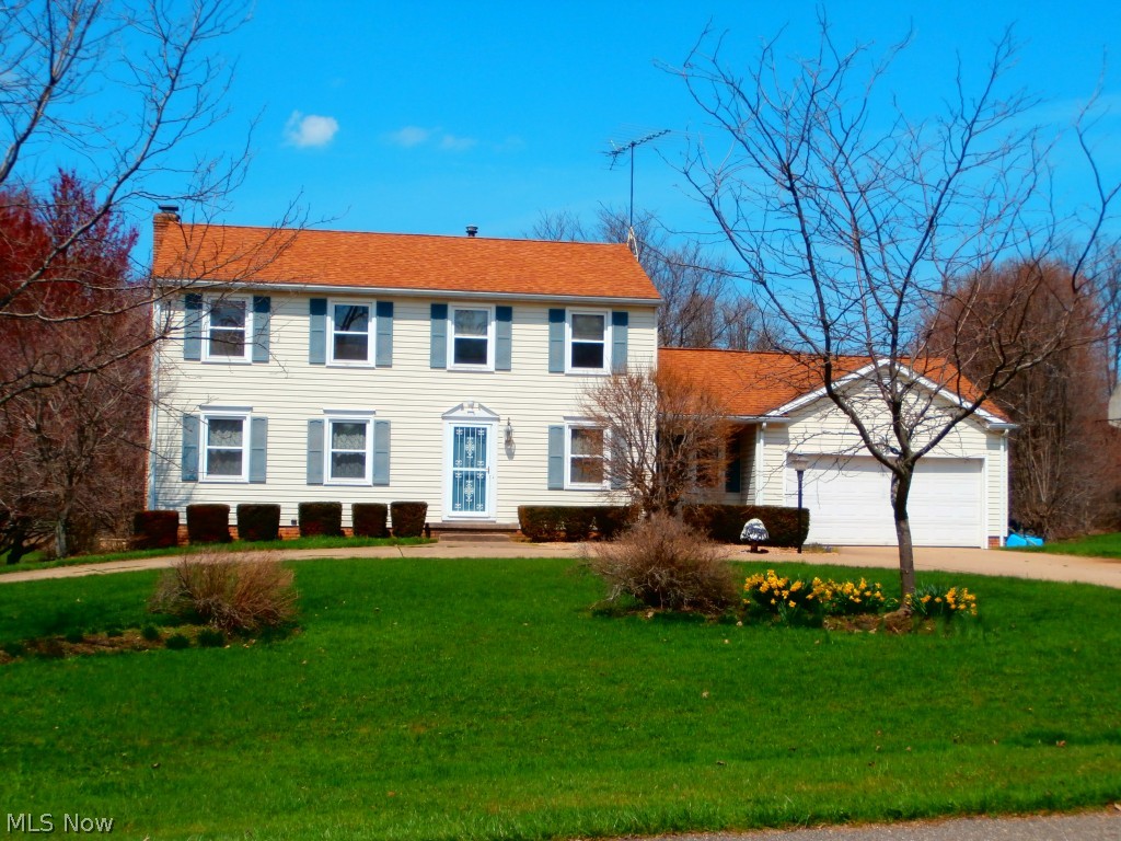 A once in a lifetime opportunity. Two story home with Lake and barn w/Loft, a family's dream. 4 BR with beautiful lake view. This home is located in a private neighborhood of stately homes. With its 4 BR/3.5 BA and a large eat-in kitchen for starters. The home features a family room w/hickory hardwood floors and fireplace as well as a large living room, elegant dining room and office on the main floor. There is a Master BR upstairs w/bath. 3 more BR's up and a second full bath. The basement is walk-out with a second family room and wood burner, workshop and full bath. Emergency natural gas back up generator and two fireplaces. The separate 24 x 24 Barn, currently a woodshop, has a large 2nd floor loft.