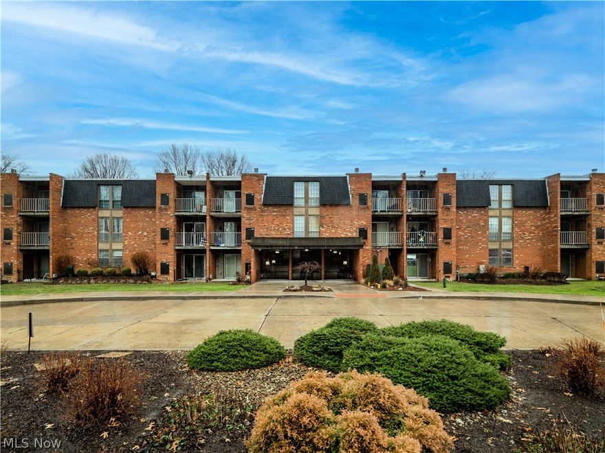 Nestled off Columbia Road in the desirable Olmsted Park Condominiums, this 2 bedroom, 2 full bath condo boasts the ease of one floor living, elevator access and convenient building amenities. Solid surface floors throughout make cleaning a breeze. The kitchen has loads of cabinet space and en-suite laundry is complete with newer washer and dryer (2022). An open dining area flows into the family room and is flanked by the private covered balcony. Both bedrooms are generous and have spacious closets. Condo 227 is easily accessible to the building entrance as well as the enclosed walkway leading to the heated garage with reserved parking spot, storage locker, and community car wash station. Other condo amenities include an outdoor swimming pool surrounded with greenspace for picnics or play, a community room, and an updated lobby.  Don't miss your chance to live in this move-in ready property! Come see today!