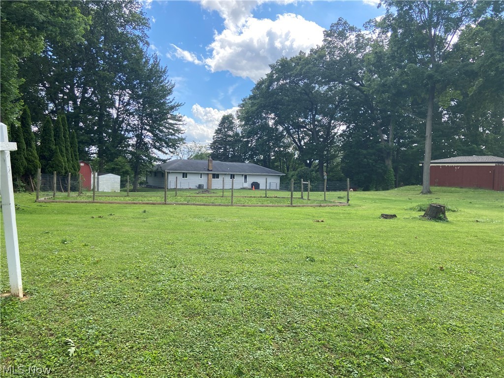 Snowy yard with a lawn