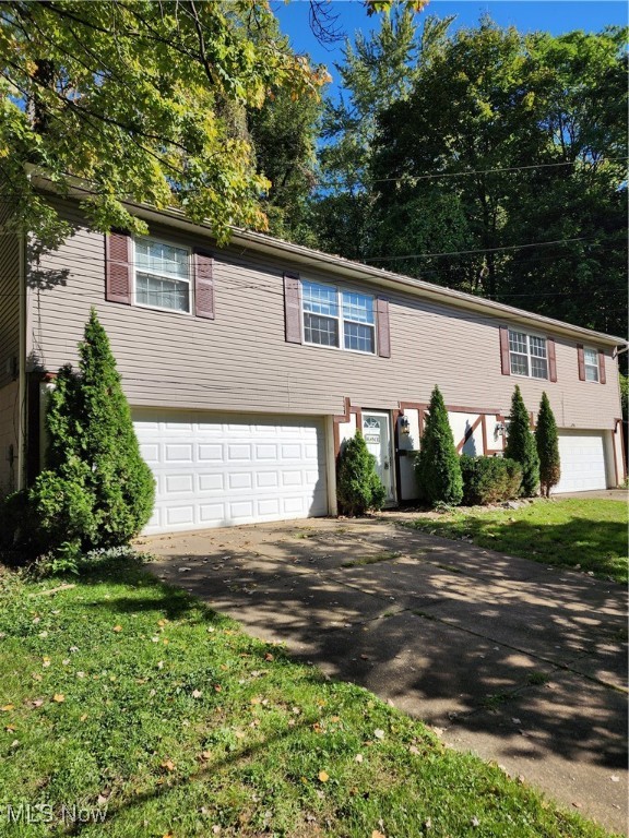 Beautifully redone duplex on very quiet dead end street with 2 attached 2 car garages. Brand new appliances, brand new flooring, newer furnaces, newer hot water tanks, roof less than 5 years old, central AC less than 5 years old. This is completely turn key.
Both units are fully rented on leases at $1,000 a month rent per unit.