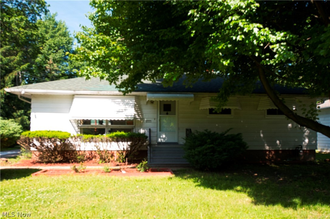 Looking for a large backyard? Look no further! This cozy ranch home sits on a large lot. Sit on the back deck and look out over the beautiful landscape. The home features three bedrooms and two and a half bathrooms. The garage roof was replaced last month. The living room and Dining room are freshly painted. The kitchen has granite countertops and comes with appliances. The basement is partially finished with a built-in bar for entertaining. This home is equipped with a Generac generator for peace of mind during those stormy nights. Two car garage has lots of space for storage. Won't last schedule a private showing today!