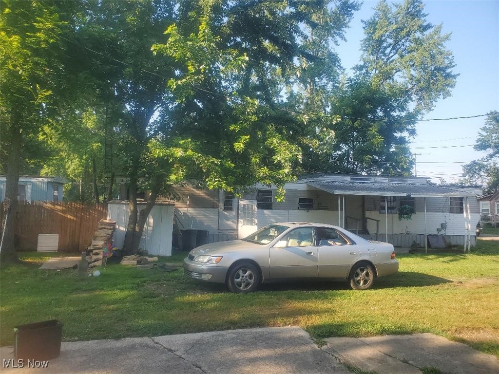 Have you ever wanted to own a trailer park?? Well, here’s your opportunity!! It sits in PLAIN TOWNSHIP and can be easily accessed from Route 62, or, 30th St. , directly behind the Advanced Auto on 62. The lot size is 50’ x 140’ (.16 acres), zoned Commercial with 3 separate sewer hook-ups and one city water meter. The site currently has 3 trailers with tenants paying lot rents $350, $350 and $450 on a month-to-month rental agreement. Lot rents include water and sewer. Owner is not responsible for any maintenance needed for trailers.
