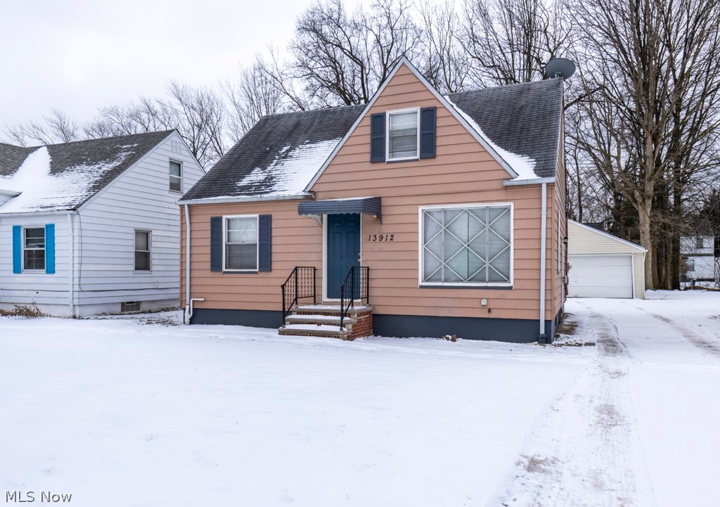 Your Golden Opportunity To Move Into Garfield Heights With All It's Amenities For Under $90,000!! Aluminum Sided Three Bedroom Bungalow/Cape Cod On A Quite, Low Traffic Street Of Manicured Homes.