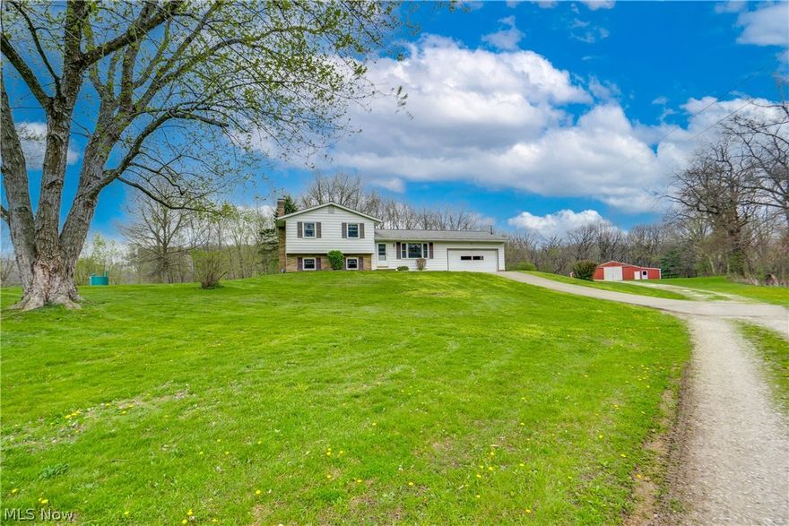 13.68-Acre Escape in Northwest Schools! Experience the perfect blend of country freedom and functional living on this 13.68-acre homesite. Whether you're an aspiring hobby farmer, a horse enthusiast, or simply seeking your own private retreat, this well-cared-for 4-level split delivers. The heart of the property is the massive 1,700+ sq. ft. barn, featuring electric, water, and 3 horse stalls. An insulated tack room/office with AC offers a comfortable workspace. Inside, enjoy peace of mind with a brand-new HVAC system (2026). The home features a kitchen with white cabinetry, a spacious living room with a view of the front acreage, and, on the lower level, a family room anchored by a brick fireplace, plus a bonus room for a home office and a half bath. Upstairs features three bedrooms and a full bath. Outdoors, the gazebo and shed provide the perfect spots for summer evenings overlooking the sprawling homesite. Don't miss your chance to see this beautiful home; schedule your showing today!