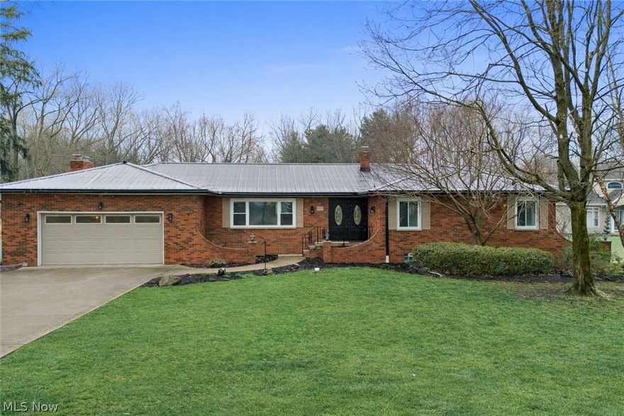 Welcome to this beautifully remodeled ranch, updated from top to bottom with high end finishes and thoughtful design throughout. The main floor features a stunning brand-new kitchen complete with quartz countertops, tiled backsplash, recessed & pendant lighting, a breakfast bar and stylish coffee bar with open shelving. The space flows seamlessly into an inviting family room, highlighted by a beamed ceiling and cozy fireplace, with easy access to the sunroom and patio- perfect for indoor-outdoor living.  The sun room even includes a built-in doggie door for your furry companions. You'll find two fully updated bathrooms on the main level, both finished with quartz countertops. One offers dual sinks, generous counter space and a separate shower and tub.  All bedrooms are generously sized and feature brand new carpet.  The lower level is an entertainers dream.  Enjoy a full kitchen, a dedicated theatre room with an 85" TV, surround sound, theatre seating and a fireplace for added ambiance- all designed with dark finishes for an authentic cinema experience. There's also a dedicated exercise room with rubber flooring and a mounted TV plus multiple storage areas. Additional lower-level features include a third full bathroom with a walk in shower, second laundry room, and a walkout basement leading to the back yard.  Step outside to enjoy a large, fully usable yard with dog runs, an above ground gas heated pool ( with supplies included) and a storage shed - ideal for both relaxation and play.  Additional highlights include : Roof, gutters and HVAC approx. 4-5 yrs old, New windows late 2025, new hot water tank March 2026, Vivit security system, 3 sump pumps with intrusion alarms, rebuilt brick entrance and front walls. Updated electrical.  This home offers the perfect blend of modern updates, functional space, and exceptional amenities ideal for every day living and entertaining.  Close proximity to parks, shopping, swimming, schools etc. 4360 finished sq ft to enjoy.