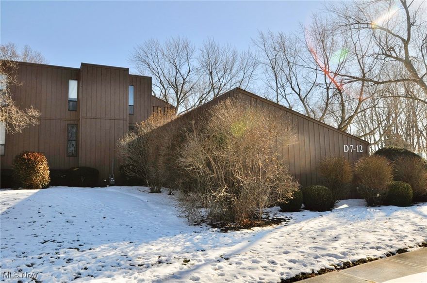 Welcome home to your updated 2 bedroom 1.5 bath ranch condo in Smugglers Cove.  This unit is located on the lower level with a walk out covered patio.  Newer hardwood floors span the foyer, living room, dining room and hallway.  The kitchen has updated wood cabinets and overlooks the open floor plan of the living/dining room.  Off the kitchen is the in-suite laundry with brand new washer and dryer.  Both bedrooms are good sized and feature walk-in closets and the windows were replaced in 2022.  The sliding glass door was replaced in 2022 and the HVAC in 2021.  Gas, water, and sewer are included in the maintenance fee, simplifying your monthly expenses.  Additionally, the condo comes with an assigned garage space and access to the in-ground pool.  Call for your private showing today!!!