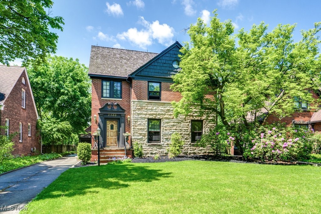 Welcome Home to this gorgeous stone and brick beauty on a peaceful tree lined street. Walkable to On the Rise bakery. This home is truly special with 4 bedrooms, 3 full and one-half baths and has retained so much of its original University Heights character! The main floor has hardwood floors, a fireplace in the living room with recessed lighting, and charming built-ins in the dining room, breakfast room and vaulted family room. Upstairs the primary suite has a 2nd fireplace, walk-in closet and a remodeled spa bathroom with large walk-in double shower and heated tile floors. 2 more bedrooms and a full bathroom complete the 2nd floor. The third-floor suite features a sitting room/office, 4th Bedroom and large full bath with clawfoot tub and loads of closet and storage space. The finished basement is ready for the next family to enjoy playing games, watching sports or sitting around the stone fireplace! Out back is an outdoor oasis with a deck, pergola, and fully fenced landscaped backyard. New Roof July 2025!
