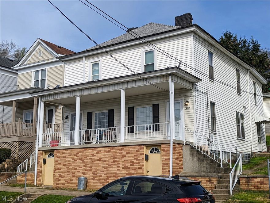 MARTINS FERRY!! This side-by-side duplex is currently occupied with a monthly income of $1075. Each unit features an eat in kitchen, living room, 3 bedrooms and 1 bathroom. There is a large covered front porch as well as a 2 car detached garage. If you are in the market for a nice investment property give us a call.