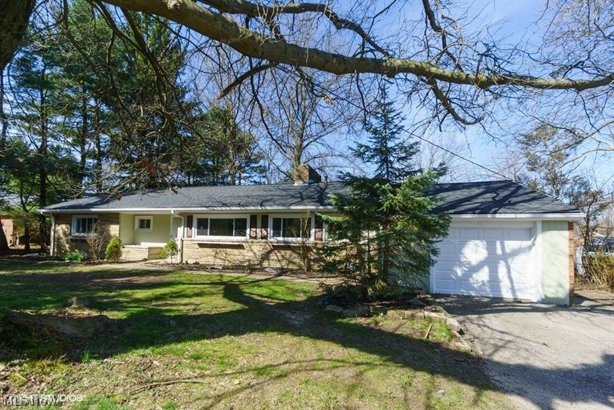 Remarkable must see home! Modernized and renovated so all you have to do is move in! Neutral fresh paint throughout, carpeting, laminate flooring in the dining room, kitchen and utility room. Be the first to cook in the updated kitchen with white shaker style cabinetry, granite counters, new appliances and lighting. Enjoy the formal livingroom with fireplace, or relax in the family room. Soon you'll be able to enjoy the enclosed patio and overlook the 265ft deep lot! The roof, garage door and front door were all replaced in 2020 as well! Don't miss out!!