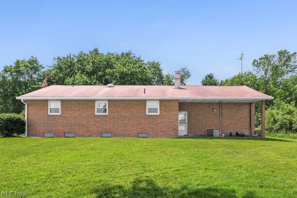 Photo of 8000 Parks Avenue NE, Alliance, OH 44601 (MLS # 5217040)