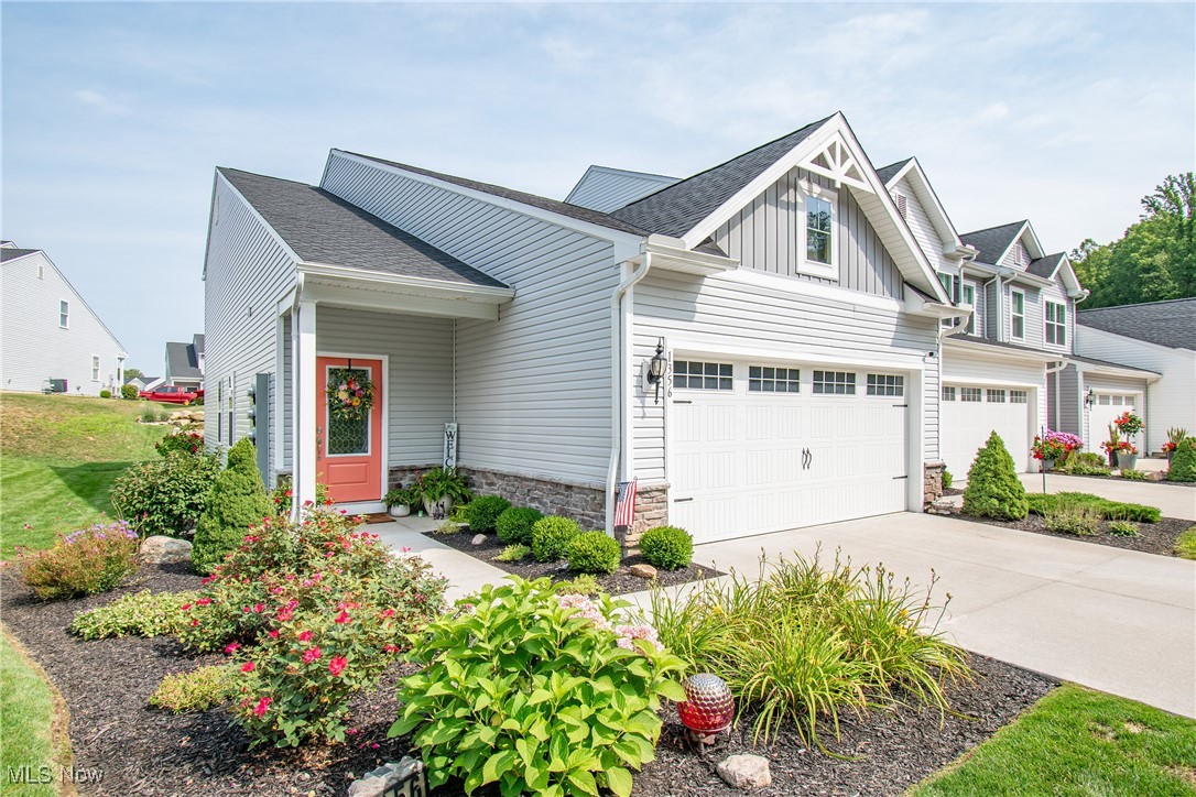 Welcome to this beautifully maintained 3-bedroom, 3-bathroom townhouse offering modern comfort and low-maintenance living. Built in 2021, this condo features a spacious open-concept first floor with a bright kitchen, dining area, and living room, perfect for entertaining or relaxing. Sliding glass doors (installed in 2022) lead to your private outdoor patio, ideal for enjoying morning coffee or evening sunsets. The first-floor primary suite includes a walk-in closet, double sink vanity, and a newly updated shower (2024) for added luxury. You'll also find the convenience of first-floor laundry a half-bathroom for guest as well as stylish laminate flooring throughout (2025). Upstairs, you'll find two generously sized bedrooms and a full bath, perfect for guests, family, or a home office. A home warranty is included for your peace of mind. Located in a convenient area close to shopping, dining, and highway access, this move-in-ready gem offers both comfort and practicality. Schedule your showing today!