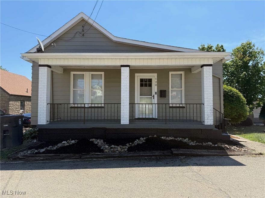 Don't miss this Cute and conveniently located and immediate possession home.  Living room and 2 bedrooms have had the original hardwood floors refinished and look great.
 The windows and roof have been replaced. Newer stove and refrigerator stay. There is an enclosed back porch which can be an office or Dining room and a front covered porch to sit and relax on. Driveway has room for a few cars and there is off street parking also. The third bedroom is captive. Good investment property . CALL TO VIEW.