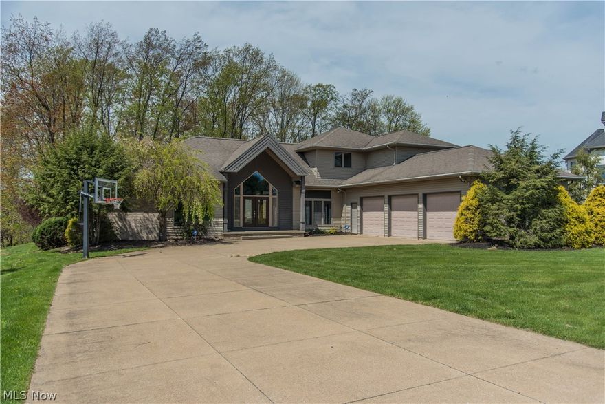 Previously featured 'Parade of Homes' residence in the Reserve at Kingsbury. This community features great amenities such as Ponds, walking trails, swimming, clubhouse and tennis. This home combines beautiful contemporary architecture with a practical layout boasting over 5,000 sq ft of living space! An impressive entry way leads you to the atrium Foyer that overlooks the covered Porch and flagstone Courtyard fashioned to act as your own private outdoor retreat. Remodeled kitchen with Amish built solid maple cabinetry, blue pearl granite counters and SS appliances. The Great Room you will find 20' vaulted ceilings, floor to ceiling fireplace and picturesque windows overseeing the private wooded lot. Den can be used as a bedroom or an office. Upstairs: 3 BR, 2 full BA and large Bonus Room! The design also optimizes natural light with French casement windows throughout the home. Very environmentally friendly home drastically reducing utility bills with two Geothermal furnaces! Oversized
