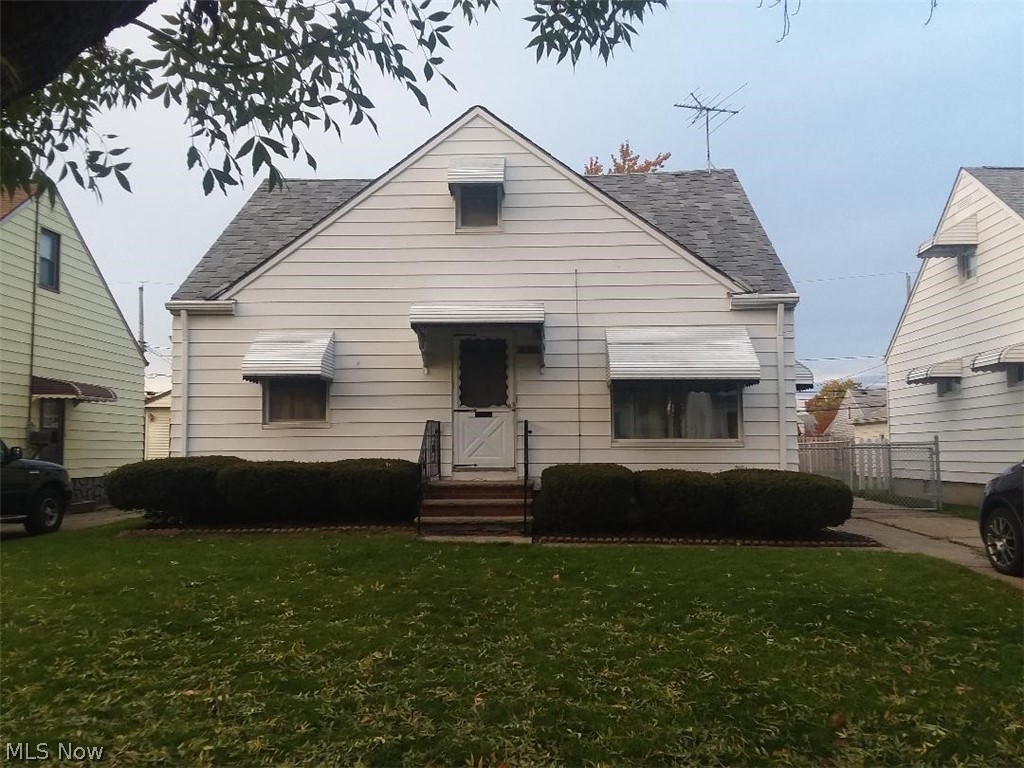 Solid 4 bdrm Cape Cod, hardwood floors and plenty of natural wood doors and molding throughout. Appliances stay,
large eat in kitchen with garden window, solid maple cabs, remodeled full bath, 2 bdrms on 1st floor, 2 bdrms up, tons
of closets and storage, built in bookshelves. Waterproofed bsmnt has large family room with knotty pine paneling and
half bath with shower, glass block windows. Updated mechanicals, new hwt, furnace with humidifier and central air,
updated electrical and new sewer line. Nice sized fenced in yard. Extra deep 2.5 car cement block garage with heater,
work bench, and engine lift! This is a great home - don't miss out!