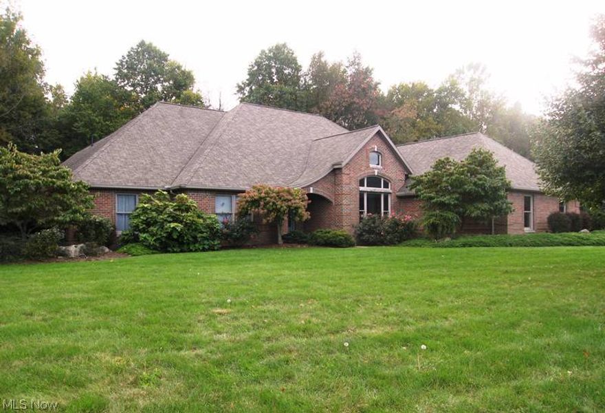 Spacious 3,608 Sq. Ft. Secluded Quality Built Brick Ranch on Just Under 2 Acres!  3 Bedrooms, 2.5 baths and 3 car garage.  Solid panel cherry doors, trim and crown molding.  Open great room with cherry Grabil kitchen and cabinets throughout.  Spacious entry foyer and large sunken living room, two tier brick patio with access from living room, kitchen and master suite which has luxury bath with whirlpool and separate shower.  1,600 sq. ft. living area in lower level.  Taxes TBD, subject to survey.