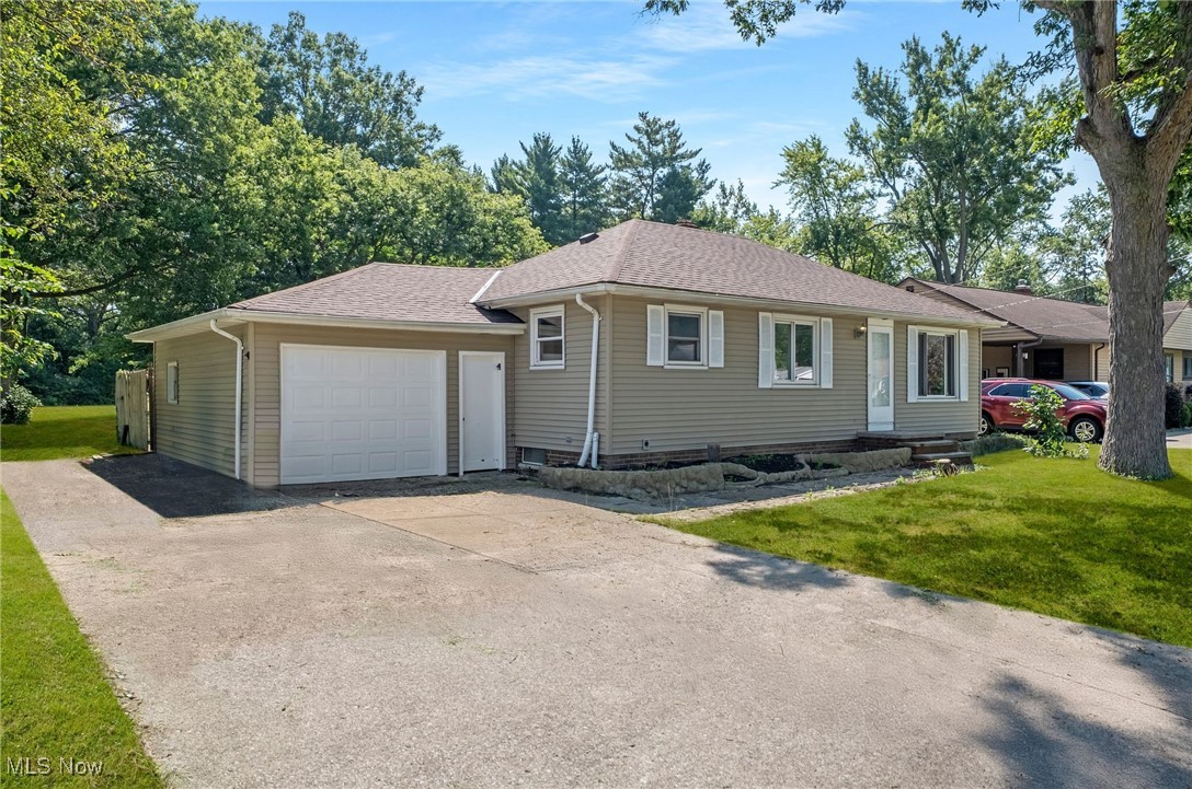 Welcome to 5861 Stearns Rd in North Olmsted, a beautifully renovated 3-bedroom, 2-bathroom home offering 1,735 square feet of modern comfort and style. Recent 2025 updates include new central air, hot water tank, roof, full home re-wiring with a new electrical panel, and new plumbing throughout. The inviting interior features freshly refinished hardwood floors, bright walls, and abundant natural light. The stunning kitchen boasts crisp white cabinetry with dark hardware, new granite countertops, and brand new stainless steel appliances. A newly updated main-floor bathroom showcases granite counters, adding a touch of luxury. The finished basement provides additional living space, while the attached one-car garage has a new door and opener for convenience. Outside, a new patio slab offers the perfect spot for outdoor relaxation. With thoughtful updates inside and out, 5861 Stearns Rd is move-in ready and ideally located near shopping, dining, and parks in the heart of North Olmsted. Don't miss out on the wonderful opportunity and schedule your private showing today!