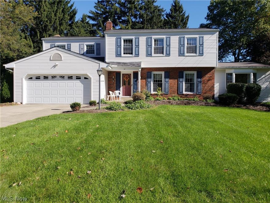 This classic center hall 4 bedroom, 3.5 bath colonial is located on a cul-de-sac in the desirable White Gate Allotment. The fully applianced kitchen has whitewashed oak cabinetry with a breakfast peninsula that adds extra seating and is open to the expansive family room. The beamed ceiling family room has built in storage cabinets that flank the brick fireplace and has inviting views of the lovely manicured back yard and two tiered deck. The formal dining room allows the extra dining space for all holiday gatherings. Beautiful hardwood floors adorn the living room and  there is great light from the over sized windows. The generously sized bedrooms also have, hardwood under the carpet. The master bedroom has a remodeled bath with granite counter top. The additional in-law suite, possible first floor master bedroom, or office with access to the deck, has an adjacent full bath and kitchenette. The windows and were replaced in 2007 and the furnace and air conditioner in 2006. Roof is new, complete tear off, 2019. The partially finished waterproofed basement adds additional space for recreation or storage.
