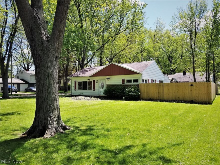 Beautiful 3 bedroom home in nice neighborhood. All newer flooring and higher end touches throughout. Privacy fence in back gives you that quiet private feel, Large corner lot has nice neighborhood feel. Detached garage is perfect  "man cave area".