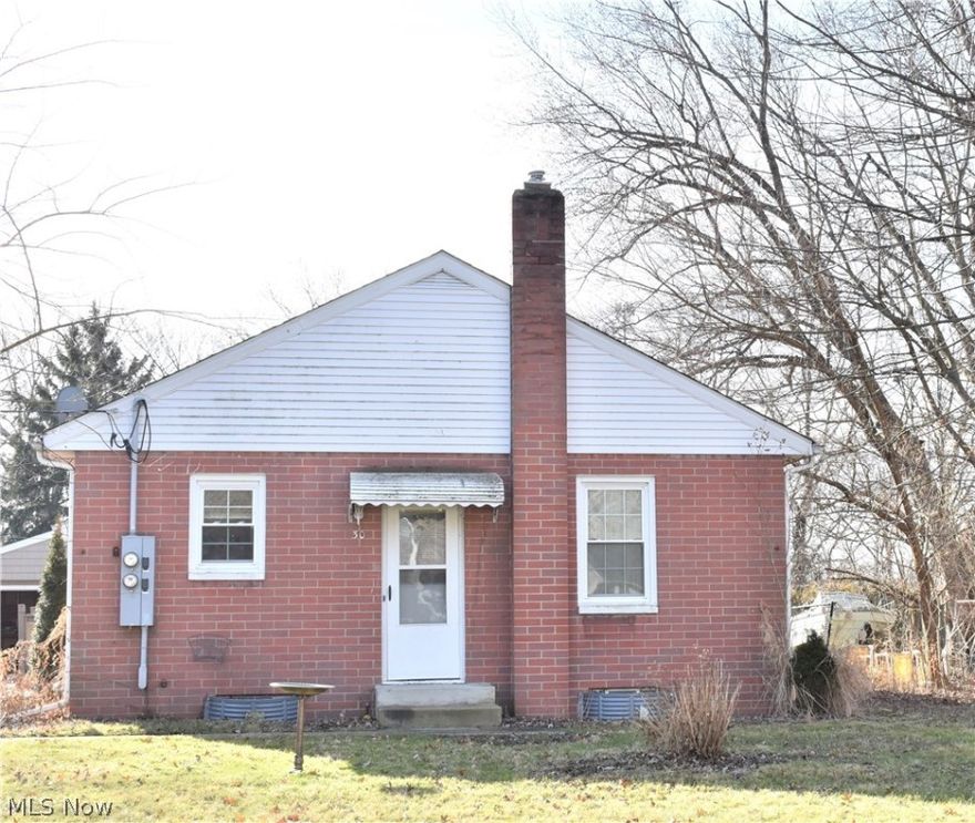 Solid brick side-by-side ranch duplex with a 2 car garage, full basement, and full occupancy. This is a fantastic rental opportunity with tenants currently in place on a month to month basis. Also the opportunity to live in one unit and lease the other to cover expenses! Tenants pay most utilities, owner only pays trash, property tax and insurance. Full basement, divided, with each unit having individual access. Detached garage for additional parking or storage!