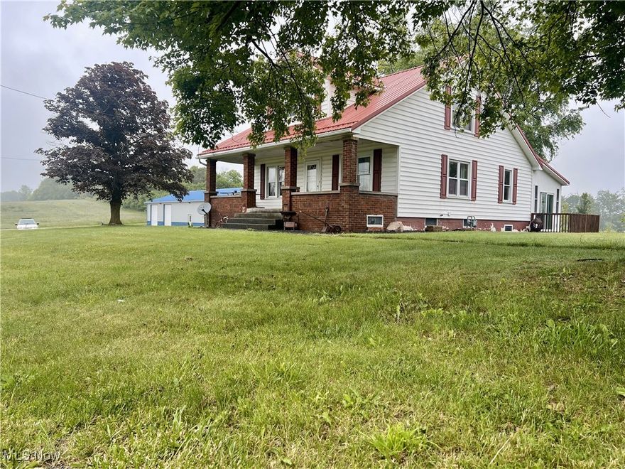 Spacious Home with Expansive Commercial Shop on 1.73 Acres – Perfect for Home-Based Business or Hobbyist!
Welcome to 7084 Germano Road SE, a unique and versatile property in the desirable Carrollton School District. Situated on a well-located 1.73-acre lot along a state route, this property offers a rare combination of comfortable residential living and functional commercial space.  The main home features over 3,000 square feet of living space, boasting four bedrooms and two full bathrooms—ideal for a growing family or anyone seeking room to spread out. You’ll also appreciate the oversized garage with five additional garage doors, offering unmatched storage or workshop potential.   Step outside and discover a massive 40’ x 80’ all-metal commercial shop, complete with a 12’ x 80’ lean-to, 13-foot ceilings, and two oversized garage doors—perfect for trucks, equipment, or large-scale projects. Inside, you’ll find three private offices, men’s and women’s restrooms, and a forced air natural gas heating system with water already installed. This building was previously used for a commercial business, making it a turnkey opportunity for your own operation.   A whole-property backup generator ensures you’ll never be without power—whether you’re working, relaxing, or entertaining.   This is the ideal setup for a family that needs both a comfortable home and a serious shop or workspace—all in one place.   Don’t miss your chance to own this incredible, multi-use property in a prime Carroll County location. Schedule your private showing today!