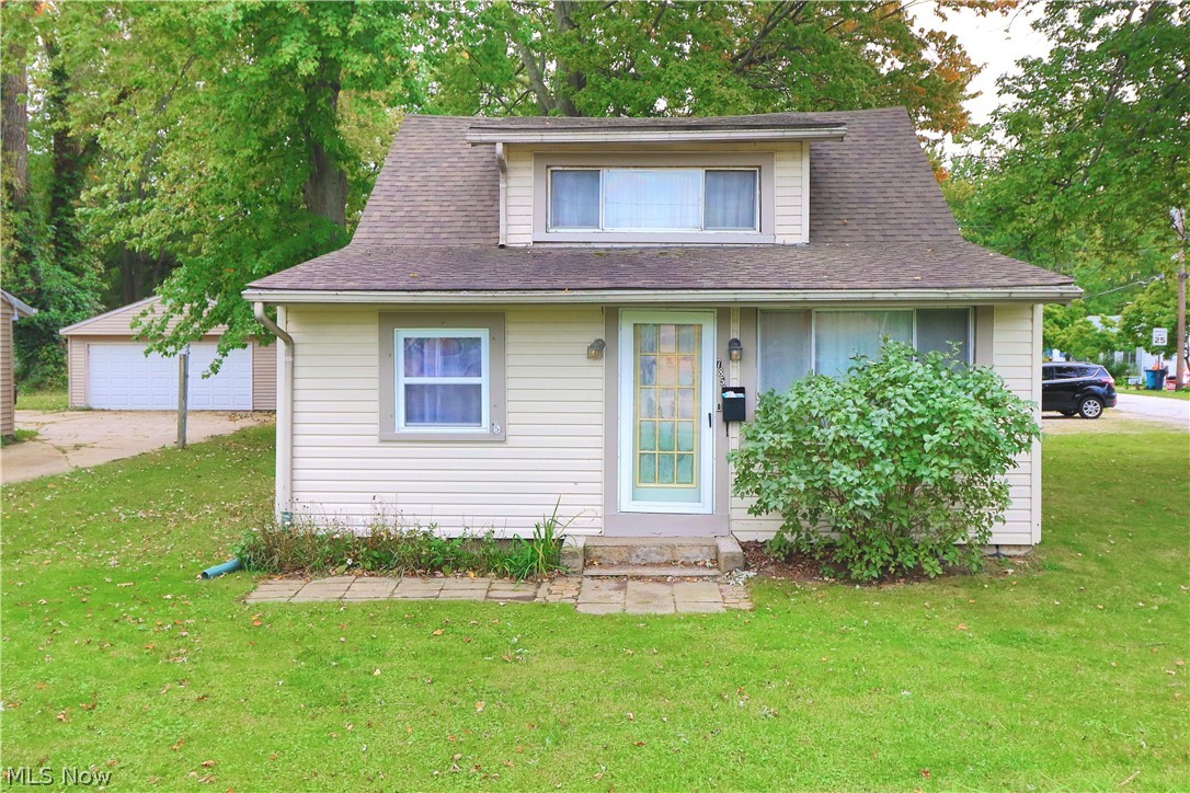Welcome to 7856 Lake Shore Boulevard! Located less than a mile from Lake Erie, this quaint and well cared for home is perfect for anyone looking for some outdoor fun! This home sits on a double corner lot with a rather large back yard. For your pleasure and entertainment, the yard has strawberry, raspberry and asparagus plants, perfect for someone looking to strengthen their gardening skills! You're also within walking distance to Mentor Beach Park! Enjoy seeing the fire works in the summer from your own yard! This home has new laminate floors(2021), new carpet in some rooms (2022), newer roof (2016), and new hot water tank (2021). Don't miss your opportunity to make this home yours! Call today for your private showing!