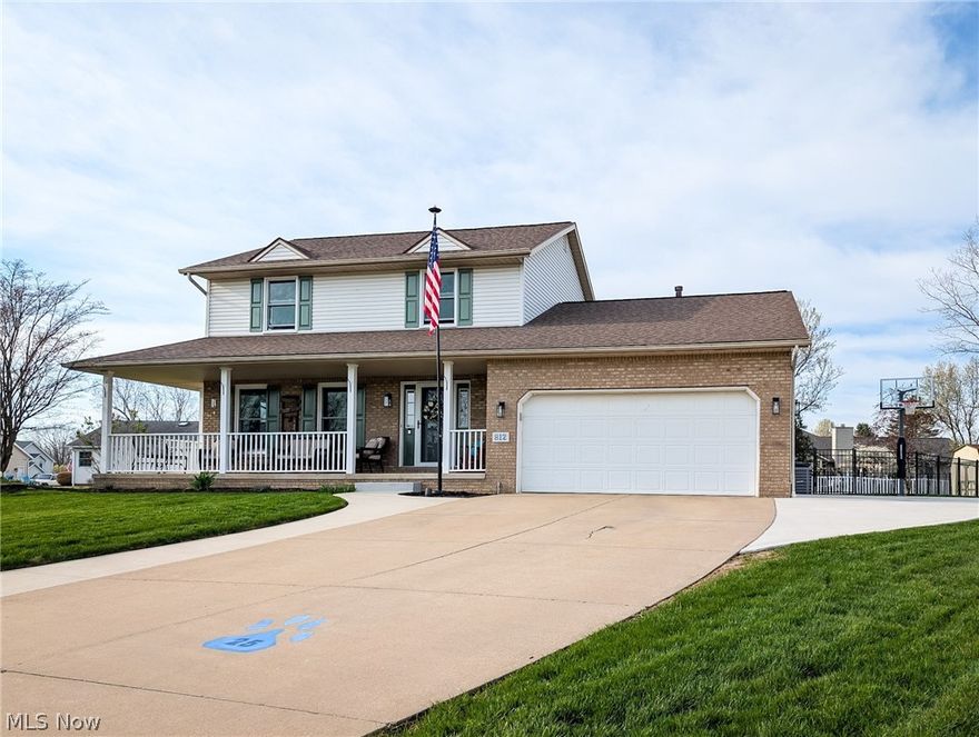 Sitting peacefully on the end of a cul de sac this beautiful 3 bedroom, 4 bathroom Colonial has been completely updated and is ready for its new owners. So much to love about this Home. Welcome your guest onto the covered wrap around front porch into the light filled and bright foyer. Direct sight lines and access to the formal living room, (currently being used as an office) or straight into the dining room, kitchen and family room spanning the entire back of the home. Spacious open concept layout will make this a great family home and or entertaining space. The kitchen is completely updated including quartz counters, a custom backsplash and a full suite of stainless steel appliances. Through a sliding glass door and onto the deck and stamped concrete patio. A nicely landscaped and manicured fenced in back yard is a great place for family play time or entertaining. Upstairs are 3 spacious bedrooms including the primary bedroom with a walk in closet and dedicated custom primary bathroom with dual sinks and a custom tile walk in shower. The lower level is pretty special. Tall ceilings, custom gas fireplace, a bar and and separate game room area and exercise space. Egress window adds safety and light. Another 1/2 bathroom completes this perfect entertaining hangout space. So many updates since 2024. Including All new flooring, paint, lighting, new kitchen counters, backsplash, New kitchen appliances, new faucets and toilets, NEW AC 2025. Nothing to do but move in.