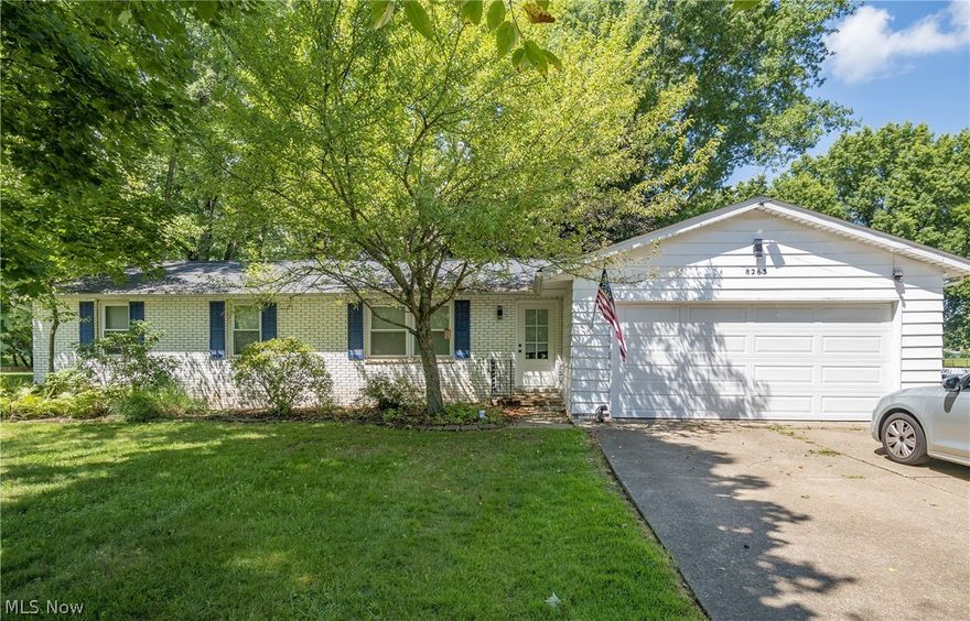 Welcome to 8263 Winterwood Avenue! Sitting on almost a half acre in Jackson School District, this beautiful ranch boasts 3 bedrooms and 1.5 bathrooms. Enjoy the spacious feel of this open floor plan main level featuring a family room with cozy fireplace, eat-in kitchen, and living room. Sitting off of the family room is a gorgeous 4-seasons room with vaulted ceilings overlooking your extended fenced-in backyard. Kitchen includes stainless steel appliances, dining area, and island with breakfast bar. The main level owner's bedroom offers a connected half bath and doors to the back deck. Large partially finished basement with possible 4th bedroom, living room, ample storage space and laundry. The backyard features a shed, gardening area, patio, and wood deck with hot tub. Don't miss your opportunity. Schedule your private viewing today!