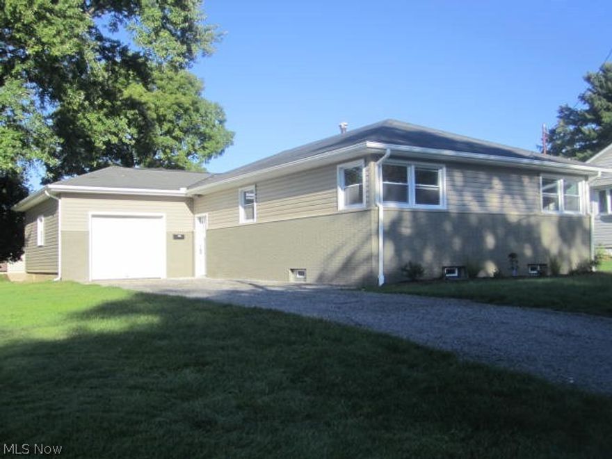 You will love this updated 3 Bedroom home.  We have a gorgeous brand new kitchen, everything new, entirely new bathroom with double sinks, beautiful hardwood floors freshly refinished, new furnace and central air,  all new lighting, new siding, new windows, new roof on back half of house, new downspouts and gutters, new 100 amp service. Back of the house has a large covered patio to enjoy your spacious back yard.   Basement is large and spacious could be finished for extra living space, new glass block windows.  Nothing for you to do but move it!