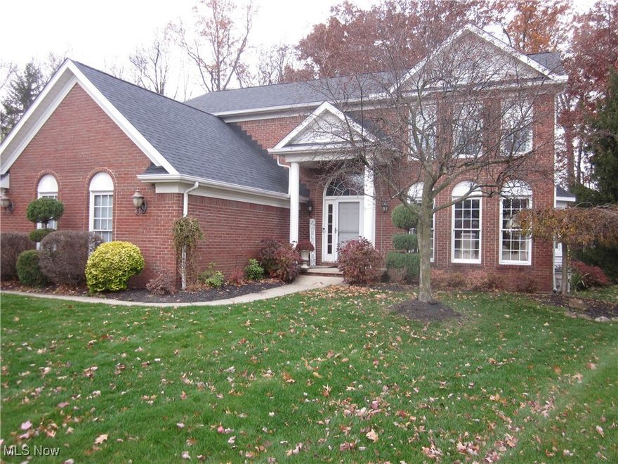 Exceptional Brick-front Colonial with 4 Bedrooms and 4 Baths on Desirable Cul de sac !  Great Location ! Impressive Updated Eat-in-Kitchen with Granite Countertops, Large Island, All Appliances, and Gorgeous Wood Floors thru-out Kitchen & Foyer !  Updates in last 10 years Include: Complete Kitchen Remodel, Hardwood Floors, Carpet, Neutral Decor, Hot Water Tank, Furnace, A/C Unit, Roof, and New Front Lawn. Large Master Bedroom w/ Master Bath & Walk-in Closet.  Formal Living Room and Dining Room, Family Room with Fireplace, and 1st Floor Laundry !  Enjoy Your Additional Living Space in the Finished Rec Room !  Exterior Deck/Patio Right Off Kitchen for Family & Summer Gatherings !  Home Warranty Included !  Call for a Showing !