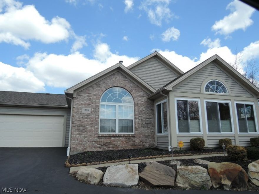 Very well maintained and updated unit!  Newer Allock hardwood floors throughout.  Freshly painted walls, ceiling trim and doors in Nov.  New liftmaster garage door opener.  Vaulted ceilings, 2 fireplaces.  2 full baths.  backs into the woods.  Golf course is off to the right.  New roof in 2013.  Very solid association great reserve fund.