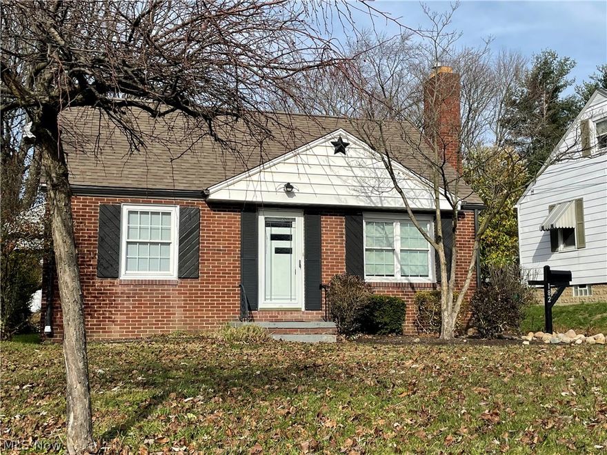Step inside this adorable all brick bungalow with a cozy gas fireplace in the living room and feel right at home. This home has 2 bedrooms on the main floor and a large bedroom upstairs with built ins and extra storage space too. The interior of the home has all been freshly painted, has hard wood floors and is ready for it's new family. The bright kitchen has newer range, dishwasher and microwave.
Large 2 car garage with glass block windows and convenient turn around area in back of the house. 
Call for your private showing today and see first hand it's charming character and curb appeal. 
Why pay rent when you can own!