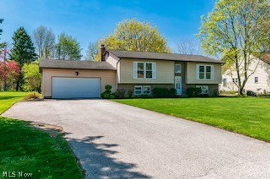 Time to check out this 4 bedroom 2.5 bath home.  Livingroom, dining room, with deck access. Eat in kitchen and Family room with fireplace in lower level along with bath, and laundry room,  Lets not forget the play room that has access to the two car attached garage.  
The many  improvement include granite countertops and butcher block center island,  newer windows, all updated vinyl flooring. Fixtures, ac and furnace,  bathrooms so much more.    The large manicured back yard completes this home and ready to move in.