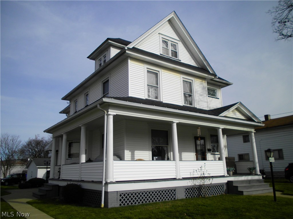 Beautiful woodwork, hardwood floors, and charm throughout this 2 story home. This 4-5 bedroom home features over 1952sf of living space, and a full finished walk up attic. First floor includes an open foyer featuring an oak staircase, beveled glass window. Living room has pocket doors and crown molding, family room with fireplace, formal dining room with built in cabinets, oak woodwork. The kitchen has lots of storage and counter space. Front and back stairways lead to second floor. The second floor includes 4 bedrooms and bath, large closets and storage. Third floor walk up attic provides additional bedroom and living space. There is also a full basement with storage rooms, workshop area, laundry. New roof on home. Newer windows. Also newer furnace and hot water tank. Comfortable hot water heat. Front porch wrap around, side patio. 2 car garage with heat and electric. Spacious and charming home with many additional features. Call for your personal viewing.