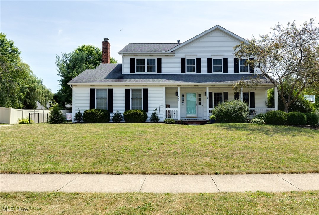 This beautiful 2-story home has 4 bedroom, 2 1/2 bathrooms and sits on 0.4 acres. The home has a covered front porch entrance to a foyer and hall with wood flooring. As you enter the formal yet comfortable living room you are greeted with built-in shelving that connects to the upgraded dining room with all the wood trimmings and tray ceiling. The large, open and updated kitchen has raised panel arch-top oak cabinets, tiled back-splash and quartz counters, center island, newer appliances. There are many windows allowing plenty of sunlight in the family room with a fireplace and built-in shelving. The master bath comes with a tiled shower stall and a spacious walk-in closet. The partially finished basement with a rec room for your casual entertaining. Most windows were replaced in home 2019, new high-efficiency furnace Oct 2020, large tiered deck, gorgeous lot, shed and a two car garage that is heated. A MUST SEE!!!